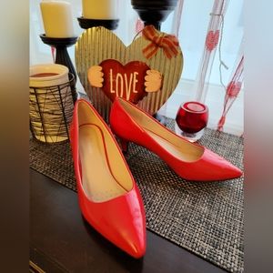 Red shiny heels